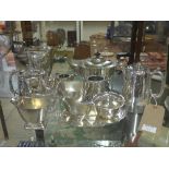 An Art Deco silver plated four piece tea service and other tea ware