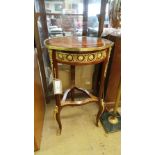 A blonde wood inlaid and brass two tiered occasional table