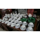 A collection of porcelain to include a Royal Worcestershire three piece silvered tea service