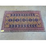 A Turkish prayer rug with camel ground having central pole medallions with multi border
157 cm x 90