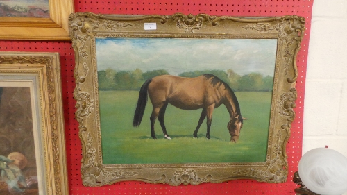 An oil on canvas depicting a horse in gesso frame