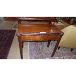 An C18th mahogany tea table with serpentine fold over top on moulded square section supports 
H 74