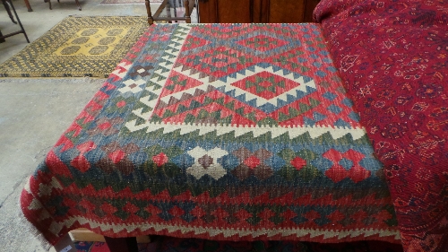 An extremely fine South West Persian Qashgai Kilim 294 cm x 206 cm repeating motifs on a rouge