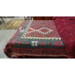 An extremely fine South West Persian Qashgai Kilim 294 cm x 206 cm repeating motifs on a rouge