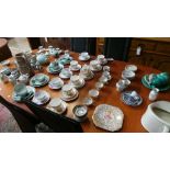 A collection of porcelain tea ware including a garden House pattern teaset and a Adderly's coffee