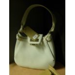 Two Salvatore Ferragamo shoulder bags including a leather Gancini white and black with serial