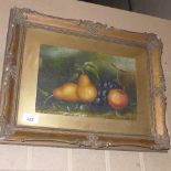 An oil on artists board still life of fruit