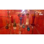 A collection of coloured glass vases including Swedish Art glass, with bubbles to the base