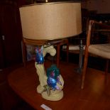 A 1950's ceramic table lamp, the base decorated with angelfish and a starfish