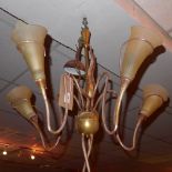An Art Deco five branch chandelier with yellow frosted glass shades