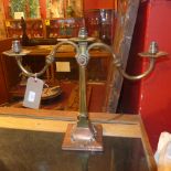 A pair of brass and copper triple branch candelabra style table lamps (re-wired)