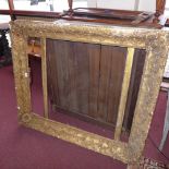 An C18th ornate gilt gesso frame with acanthus leaf decoration