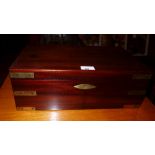 A C19th mahogany and brass bound writing slope with tooled leather fitted interior