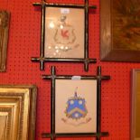 Two C19th hand painted armorial crests in ebonised Oxford frames