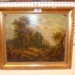 A C19th oil on panel of figures in a woodland landscape,