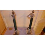 A pair of Corinthium column form silver plated and green marble table lamps on pedestal bases