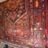 A fine North West Persian Zanjan rug, 212cm x 195cm, central pole medallion on a terracotta field
