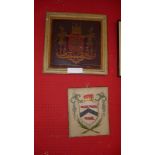 A C19th oil on panel armorial crest together with a C19th unframed oil on canvas armorial crest