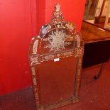 A Venetian wall mirror having etched floral and urn surmount detail and divisional plates