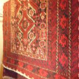 A fine North East Persian Meshad Belouch rug, 220cm x 100cm, triple pole medallion with repeating