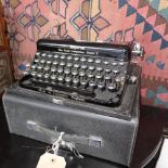 A mint condition Imperial journalist's typewriter 'The Good Companion' Model T with travel case and