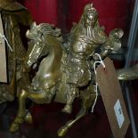 A Chinese metal figurine of warrior on horseback