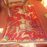 A Persian rug the red field having image