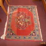 A hand knotted Persian prayer rug, the r