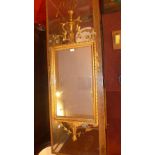 An C18th style gilt wall mirror of recta