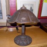 An unusual Art Nouveau metal lamp the petal shade on a naturalistic base