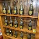 Fifteen empty Don Perignon bottles