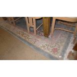 A French Aubusson rug the biscuit fields with allover foliate decoration