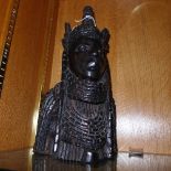 A Nigerian carved ebony bust of a tribal figure H 40 cm