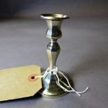 An early Victorian silver dwarf candlestick, London 1838-9, of baluster form, having circular nozzle