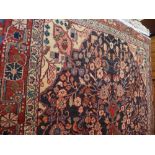 An extremely fine central Persian Sarovic rug 200 cm x 125 cm central pendant floral medallion