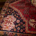 A fine South West Persian Qashgai carpet 242cm x 153cm, central pendant medallion, repeating petal