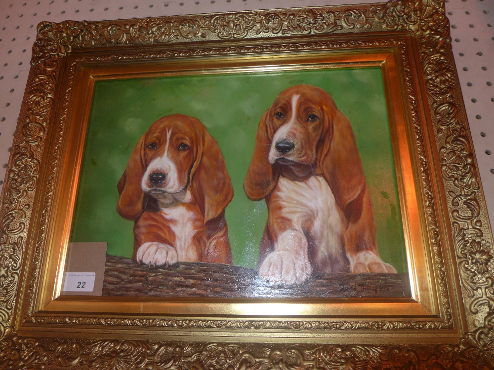 An oil on board depicting two puppy Bass