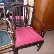 Two slate back mahogany chairs including a carver having cherise drop in seat raised upon tapering