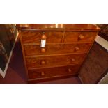 A C19th figured mahogany chest fitted two short and three long drawers raised on plinth base