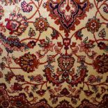 A Bokhara style rug with repeated guls on a red field surrounded by borders 190x140