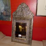 An early 20th century wall mirror, the bevelled plate within,