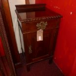 An Edwardian carved mahogany bedside cabinet fitted single drawer and panel door