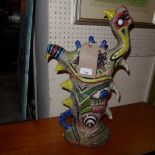 An unusual Picasso style painted pottery sculpture signed S. Foster