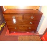 A C19th mahogany chest of two short over two long graduated drawers raised on splayed supports.