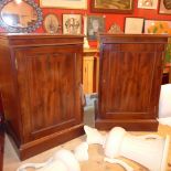 A pair of C19th mahogany bedside cabinets with single panel doors in plinth bases