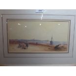 A watercolour beach study signed Brien, glazed and framed.