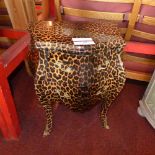 A French style two drawer commode chest with leopard print finish and gilt metal handles