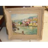 An oil on board riverside village within a heavy white frame