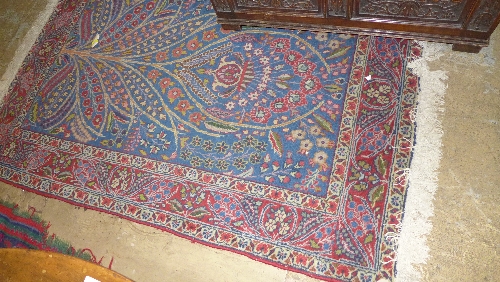 A Persian style rug with tree decoration