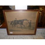 A print of a horse entitled caravan in oak frame